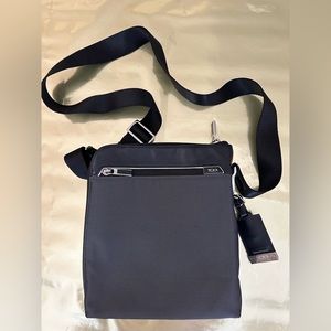 Tumi crossbody travel bag keep passport safe